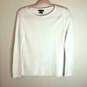 White, thin, long sleeve, perfect for layering or wearing under a cute vest